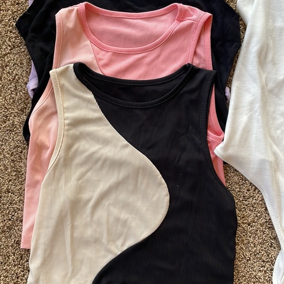 NEW size large but runs more like medium, and a body suit size small.  Lot of 4 - Picture 4 of 9